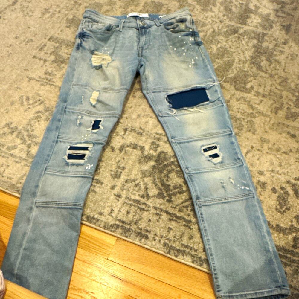 GUESS Los Angeles Men's Slim Tapered Light Wash Distressed Stretch Denim Jeans
